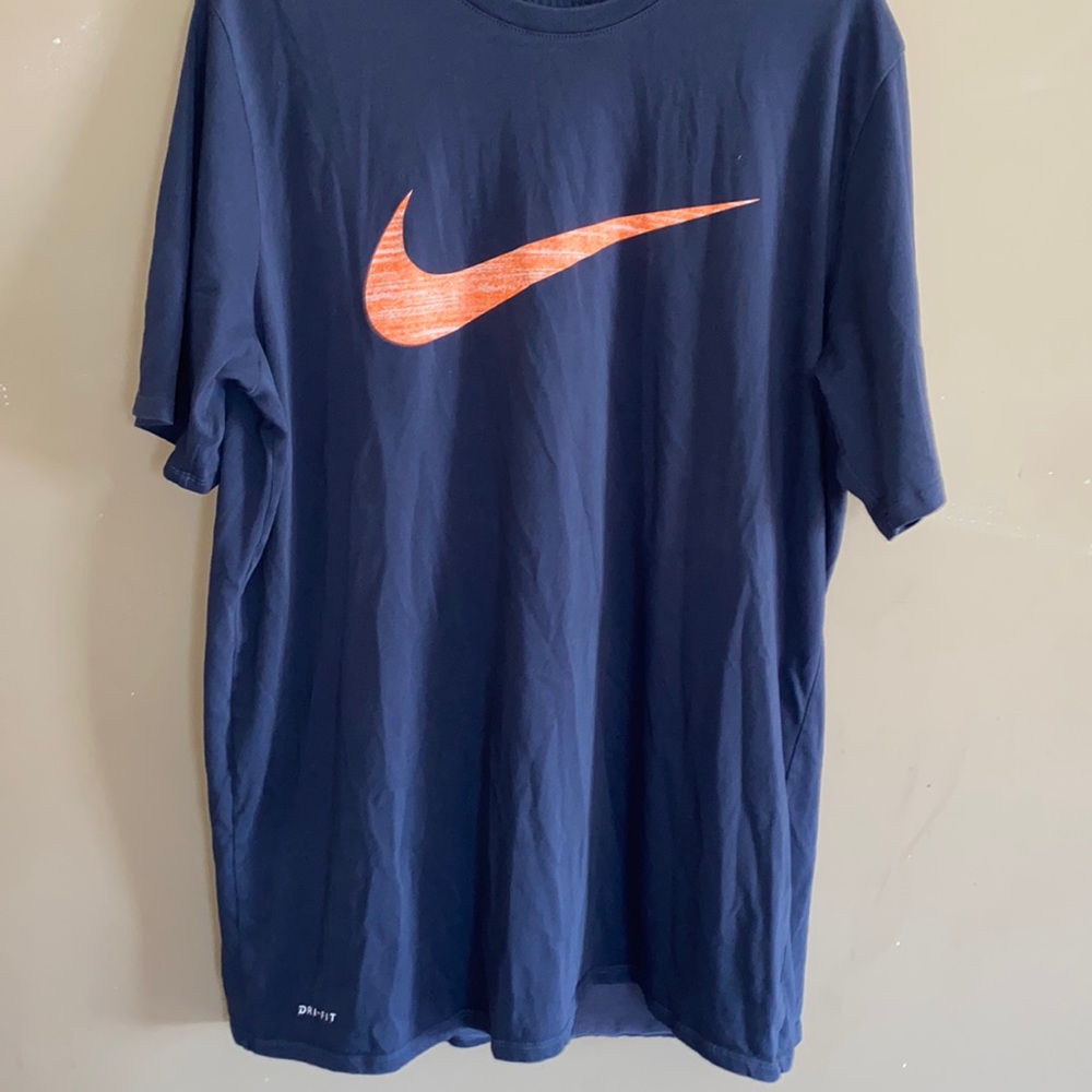 Nike dry-fit tee, periwinkle color with orange & white check mark